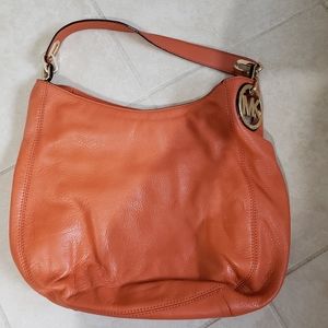 Orange leather shoulder bag